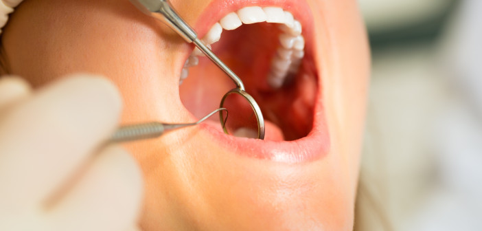 Patient with Dentist - dental treatment