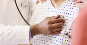 Doctor Listening to Patient's Chest