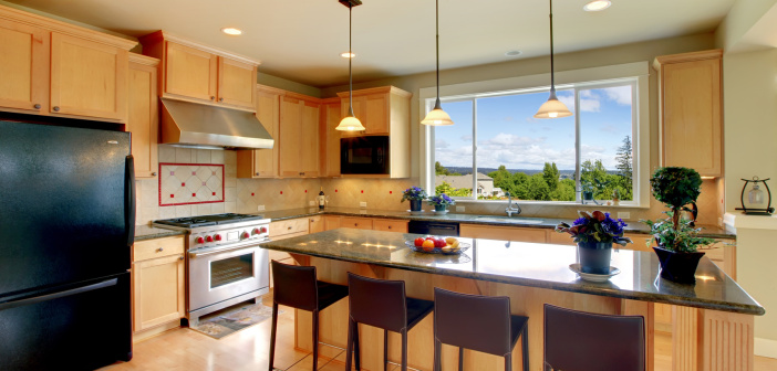 Can a Kitchen Remodel be Done on a Tight Budget? Luxury classic wood kitchen with island and chairs.