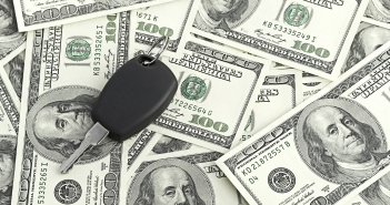 Car Key on 100 dollar background