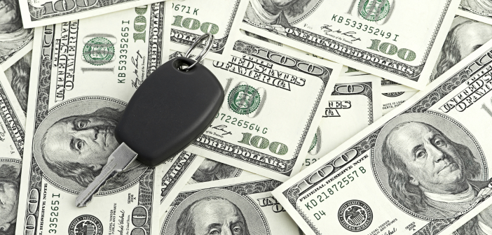 Why Car Title Loans Are a Good Idea Car Key on 100 dollar background