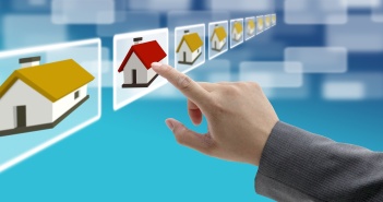 man hand Finding new property in real estate market with electro
