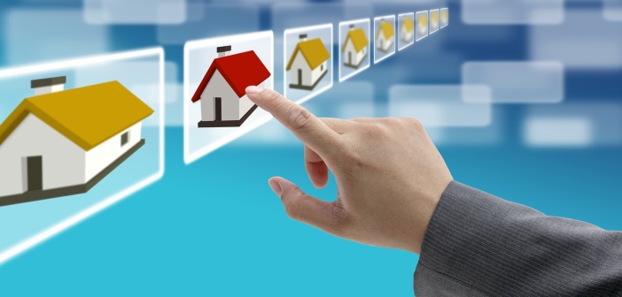 man hand Finding new property in real estate market with electro