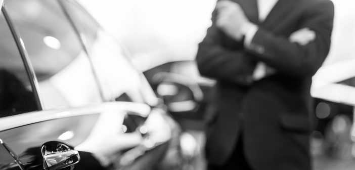 5 Best Reasons to Hire a Limousine Service Choosing a car at dealership.