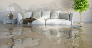 Water damage in house after flooding with stains on the wall